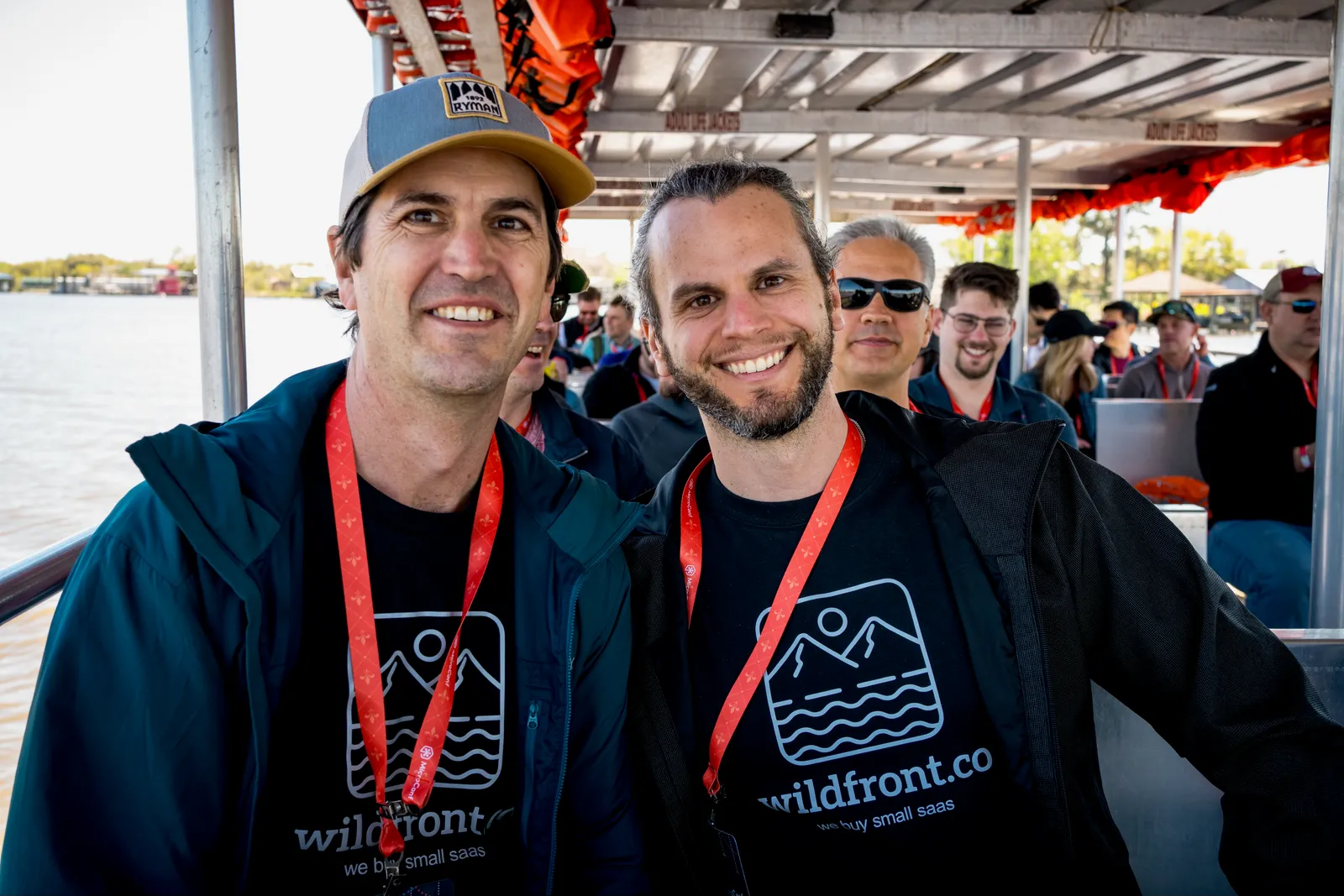 Attendees on a boat excursion during MicroConf social event