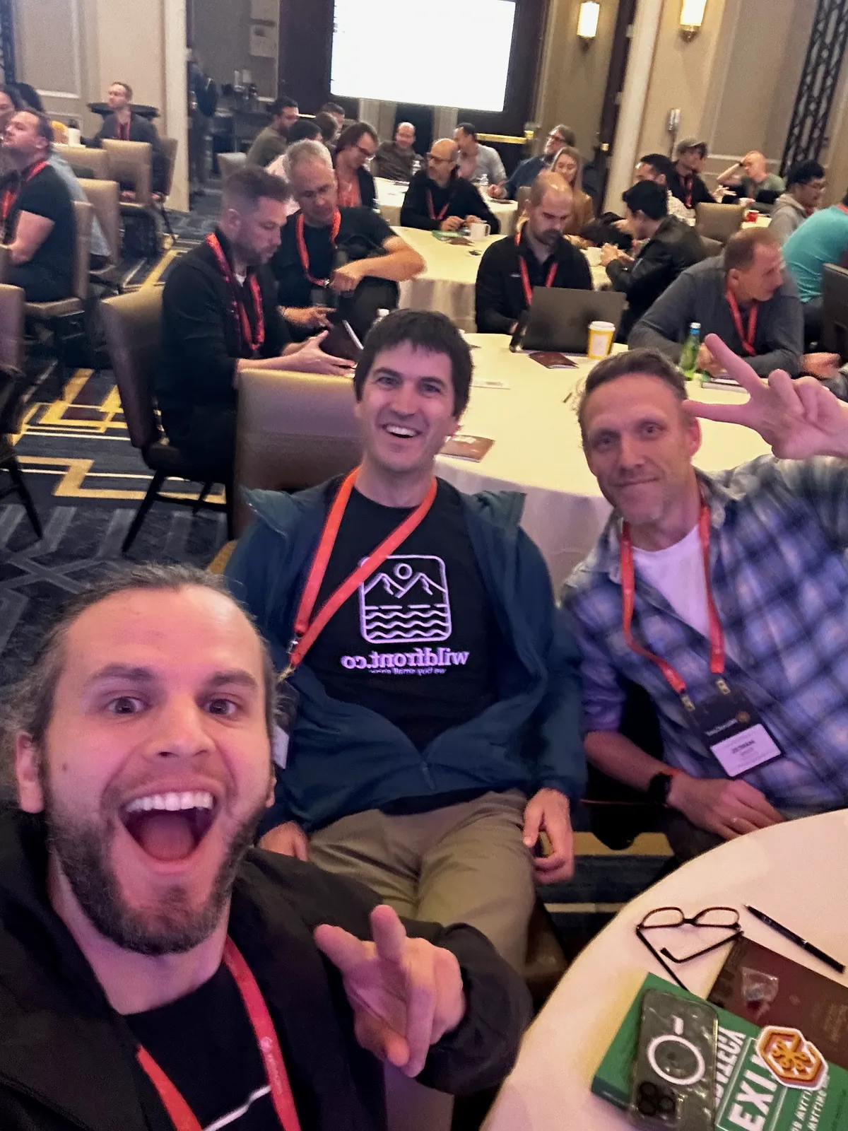 Attendees networking at MicroConf conference